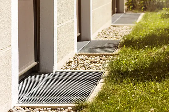 Gutter, gutter, drain for water in front of Door. Drainage Systems, Guter Grate, Gutter Floor, Drainage cover along perimeter House. Selective focus. 